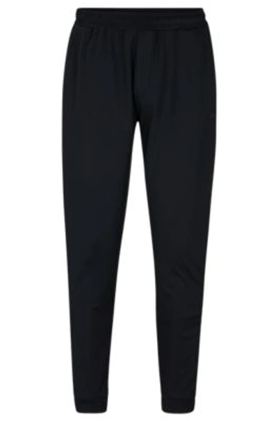 Hugo Boss Cuffed Tracksuit Bottoms In Active-stretch Fabric In Black