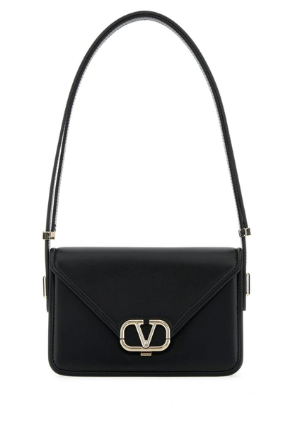 Valentino Garavani Handbags. In Black