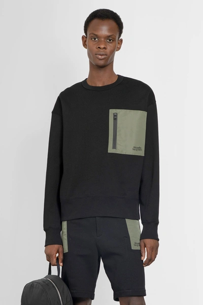 Alexander Mcqueen Contrasting Pocket Crew Neck Sweatshirt In Black