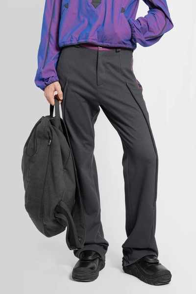 Kiko Kostadinov Man Black Trousers In Purple