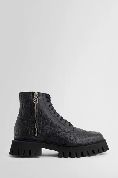 Gucci Gg Supreme Leather Boots In Black