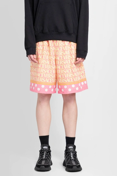 Versace Allover-print Elasticated Shorts In Pink,ivory
