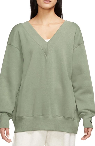 Nike Women's  Sportswear Phoenix Fleece Oversized V-neck Sweatshirt In Green