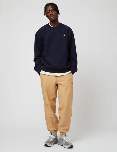 Carhartt Logo-patch Cotton Straight Trousers In Brown