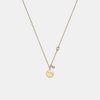 Coach Outlet Aries Coin Pendant Necklace In Yellow