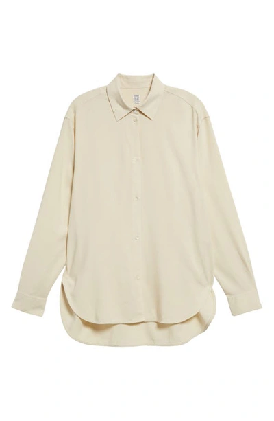 Totême Relaxed-fit Curved Hem Shirt In Stone