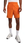 Nike Dri-fit Unlimited 7-inch Unlined Athletic Shorts In Campfire Orange