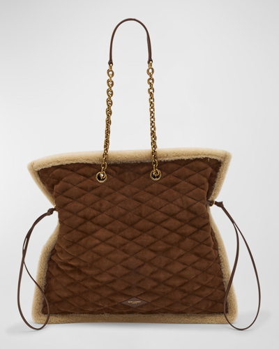 Saint Laurent Le Pochon Quilted Shearling Shoulder Bag In 2281 Dk Sig Nbeig