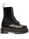 Dr. Martens' Platform Boots With Treaded Sole And Distinctive Accents In Black