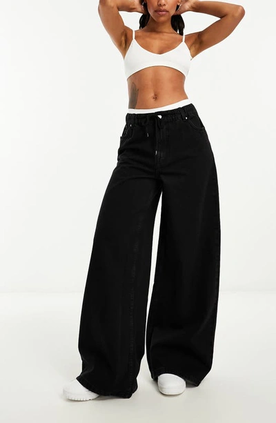 Asos Design Pull On Wide Leg Jeans In Washed Black