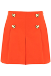 Moschino Heart-shaped Button Detail Shorts In Red