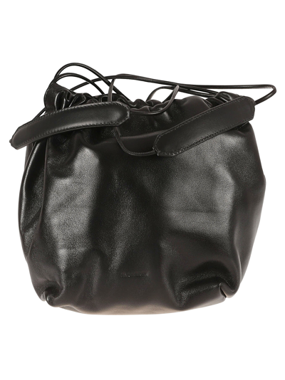 Jil Sander Logo Embossed Drawstring Medium Shoulder Bag In Black