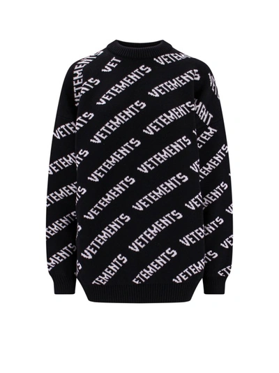 VETEMENTS MERINO WOOL SWEATER WITH ALL-OVER LOGO