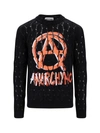 Moschino Sweater In Black