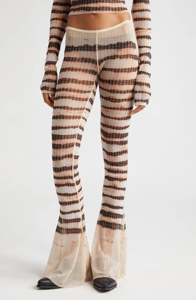 Jean Paul Gaultier Stripe-print Flared Trousers In Beige