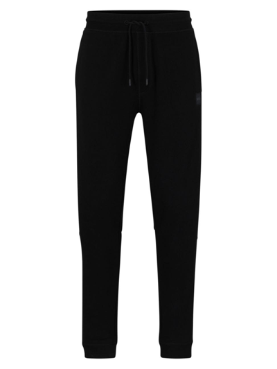 Hugo Boss Cotton-terry Tracksuit Bottoms With Logo Patch In Black
