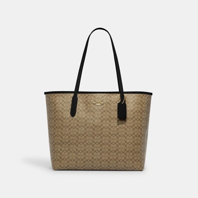 Coach Outlet City Tote In Signature Canvas In Beige