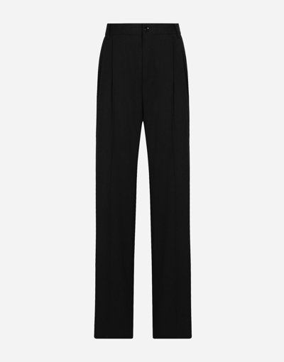 Dolce & Gabbana Flared Woolen Trousers In Black