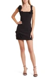 Elliatt Trompe Rosette Minidress In Black