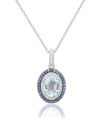 Suzy Levian Sterling Silver Oval Cut Blue Topaz And Sapphire Accent Pendant