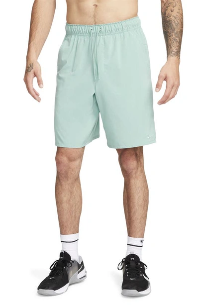 Nike Men's Unlimited Dri-fit 9" Unlined Versatile Shorts In Green