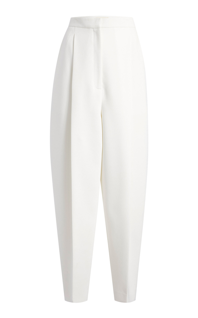 KHAITE ASHFORD PLEATED WOVEN TAPERED-LEG PANTS