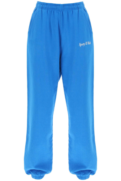 Sporty And Rich Italic Logo Joggers In Blue