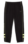 Lacoste Water Resistant Athletic Pants In 6vt Noir/ Limeira