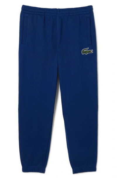 Lacoste Relaxed Fit Sweatpants In F9f Methylene
