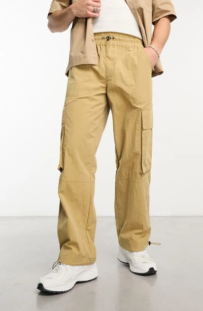 Asos Design Wide Leg Nylon Cargo Pants With Elastic Waist In Beige-neutral