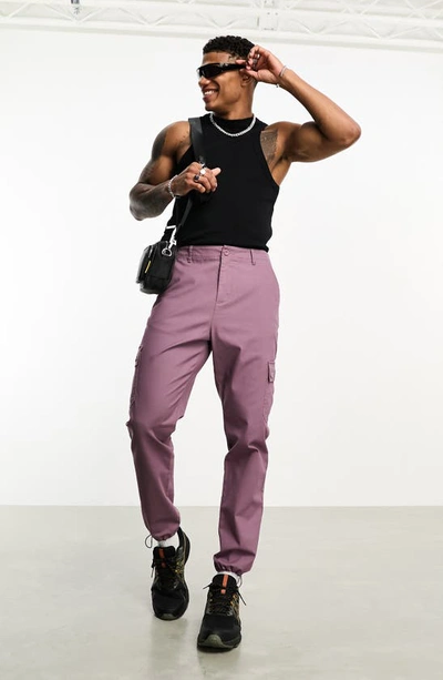 Asos Design Tapered Cargo Pants In Purple
