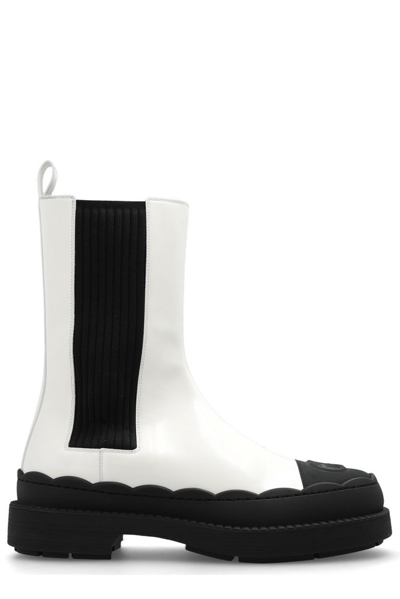 Gucci Gg Debossed Ankle Boots In White