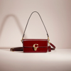 Coach Restored Studio Baguette Bag In Brass/wine