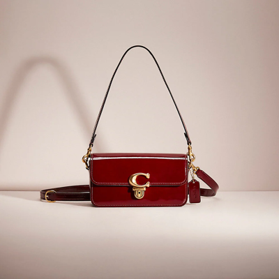 Coach Restored Studio Baguette Bag In Brass/wine