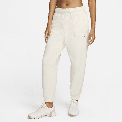 Nike Women's Therma-fit One Loose Fleece Pants In Brown