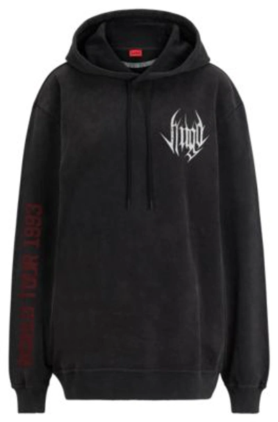 Hugo Peached-cotton Relaxed-fit Hoodie With Seasonal Artwork In Black