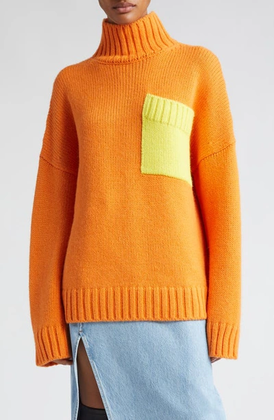 Jw Anderson Knitted Patch-pocket Jumper In Brown