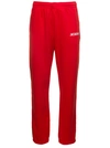 JACQUEMUS JACQUEMUS RED JOGGER PANTS WITH LOGO PRINT IN COTTON MAN