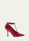 Valentino Garavani Rockstud Patent T-strap Pumps In Ju5 Rouge Pur