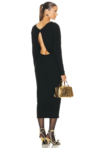 Khaite The Trina Long-sleeved Open-back Midi Dress In Black