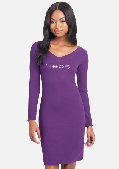 Bebe Crystal Logo Long Sleeve Dress In Imperial Purple