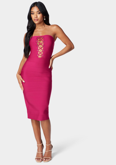 Bebe Bandage Lace-up Strapless Dress In Fuchsia Red