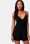 Bebe Tiered Waist Tie Front Romper In Black