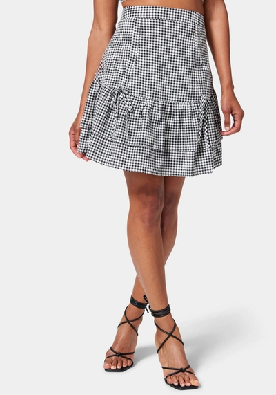 Bebe Mini Gingham Front Ruching Flutter Skirt In Black,white Alyssum
