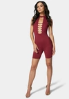 Bebe Caged Biker Short Romper In Marsala