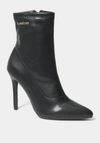 Bebe Kandey Boots In Black Faux