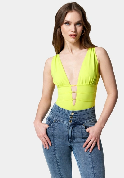 Bebe Sleeveless Ruched Deep V Knit Bodysuit In Cyber Lime