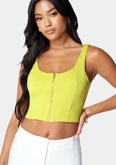Bebe Sleeveless Front Zip Bustier Knit Top In Cyber Lime