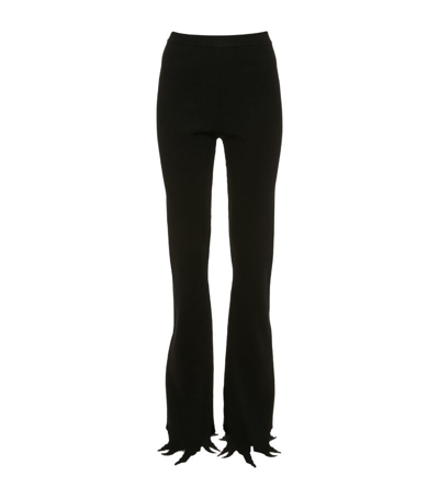 Jw Anderson Distressed Flared Trousers In Black