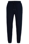 Hugo Boss Relaxed-fit Tracksuit Bottoms With Mirror-effect Logo In Navy